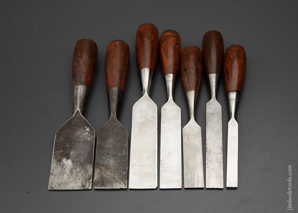 Sold at Auction: A quantity of hand tools including Stanley wood chisels,  brass plumb bobs, Titan chisels and steel gauge markers, (15 item total),  the largest chisel 27cm long.