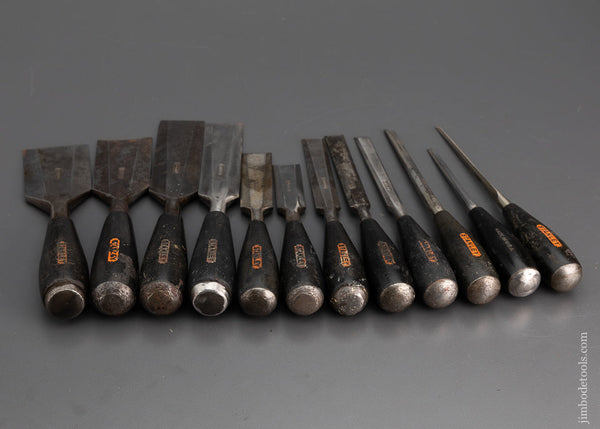 Sold at Auction: A quantity of hand tools including Stanley wood chisels,  brass plumb bobs, Titan chisels and steel gauge markers, (15 item total),  the largest chisel 27cm long.