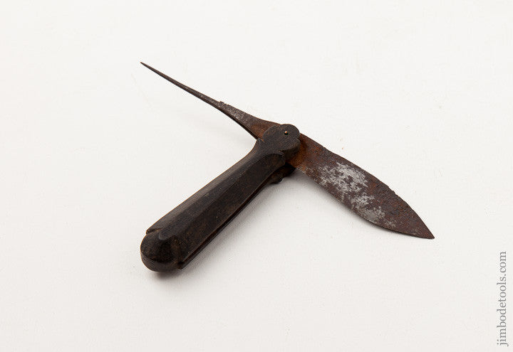 Early Ebony Patch Knife with Flash Hole Pick 